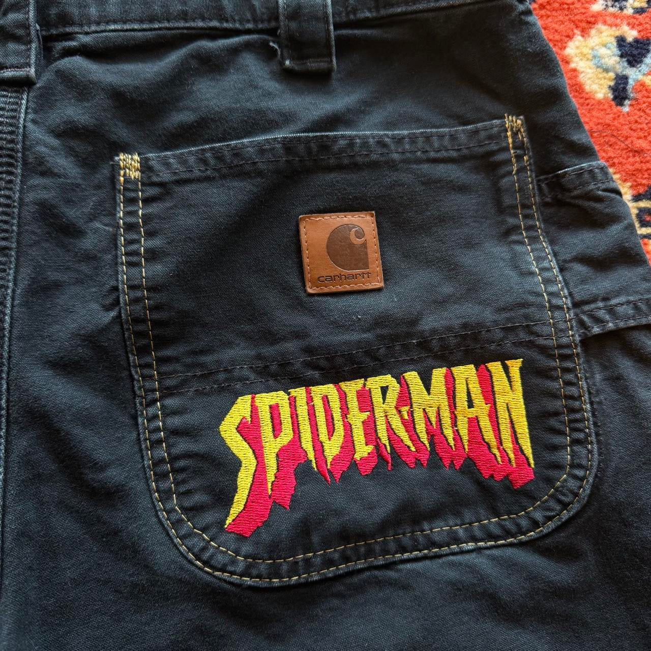 (32) spider man embroidered jorts